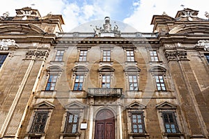 Facade of Complesso di San Firenze after rain