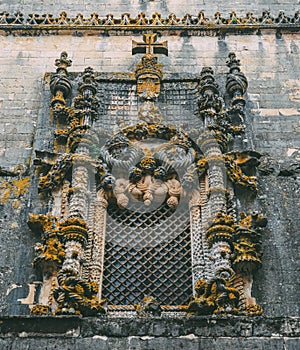 Facade of the Convent of Christ with its famous intricate Manueline window in medieval Templar castle in Tomar, Portugal