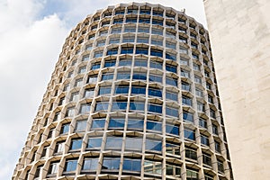 Facade of a cylindrical office skyscraper photo