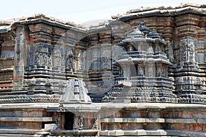 Facade, decorative friezes with animal figures, and walls depicting Hindu deities. Chennakeshava temple. Belur, Karnataka. North W