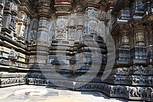 Facade, decorative friezes with animal figures, and walls depicting Hindu deities. Chennakeshava temple. Belur, Karnataka. North W