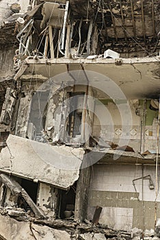 facade of a destroyed building. section of the building with a view of the destroyed apartments. Ukraine. Kyiv region.