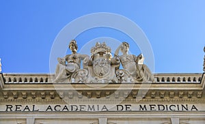 Facade detail of Real Academia Nacional de Medicina building. Located in Arrieta Street, Madrid, Spain.