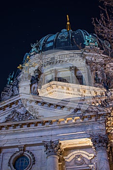 Facade details on the Berlin Cathedral Berliner Dom at night in Berlin, Germany