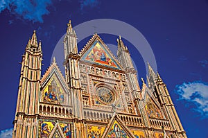 Facade details of the opulent and monumental Orvieto Cathedral in Orvieto.