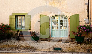 Facade door window bench flowers