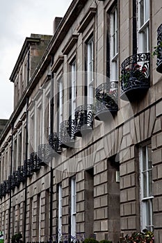 Facade of Edinburgh Town Houses showing ornate balustrades.