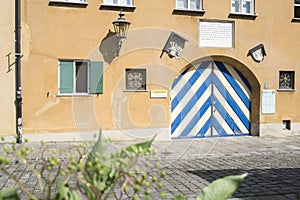 Facade and Entrance Door to the historical Fuggerei in Augsburg