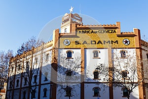 Facade of the Estrella Damm beer brewery in el Eixample in Barcelona, Catalonia, Spain, Europe