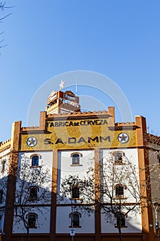 Facade of the Estrella Damm beer brewery in el Eixample in Barcelona, Catalonia, Spain, Europe