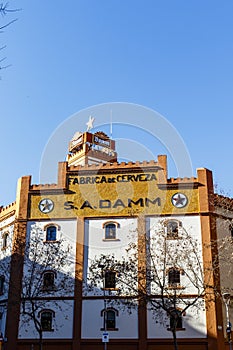 Facade of the Estrella Damm beer brewery in el Eixample in Barcelona, Catalonia, Spain, Europe photo