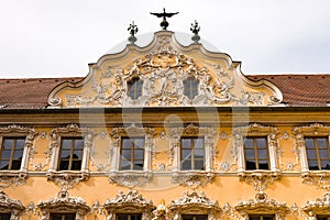 Facade of the Falkenhaus at the Upper Market Square in Wuerzburg`s Old Town
