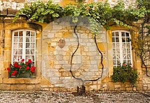 Facade with flowers Monpazier