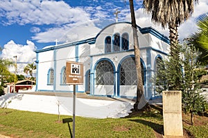Facade and garden of the Greek Orthodox Church Panaghya Tsambika in the city of Lins,