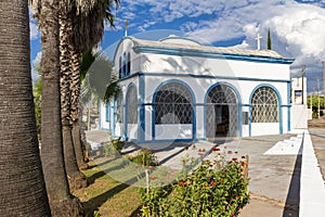 Facade and garden of the Greek Orthodox Church Panaghya Tsambika in the city of Lins