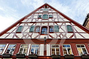 Facade of a half-timbered house in the historic center of Rothenburg ob der Tauber in South Germany