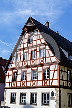 Facade of a half-timbered house in the historic center of Rothenburg ob der Tauber in South Germany