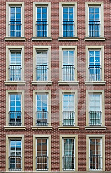 Facade of a Hamburg house with bricks and 16 windows