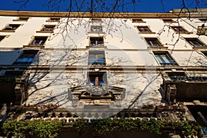 Facade of historic residential building along corso Sempione in Milan