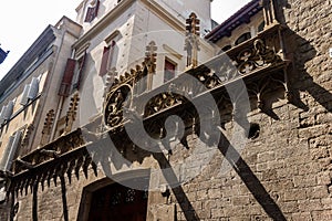 Facade of a historical building in old Barcelona, Catalunia, Spain photo
