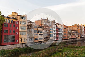 Facade of the houses on the bank of river Onyar. Girona, Catalonia, Spain.