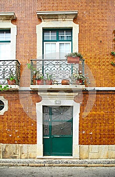 Facade of living house in Faro city