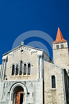 The facade of a medieval church in Villeneuve-de-Berg