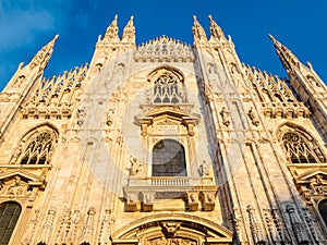 Facade of Milan Cathedral at sunset