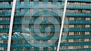 Facade of moderm multi storey glass building. Architecture abstract background. Building skyscraper house, industrial