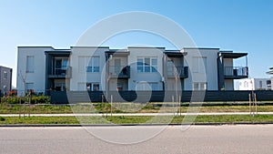 Facade of a modern apartment condominium in a sunny day. New, Luxury Apartment Building.