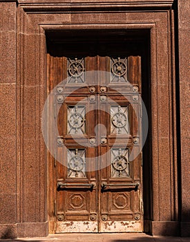 Facade of modern building. Old-fashioned brown front door