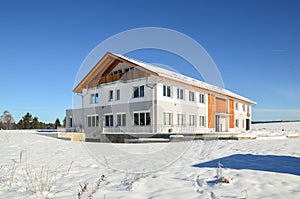 Facade of a modern commercial building shortly after its completion in winter