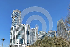 Facade of modern luxury apartments against blue sky background on a sunny day