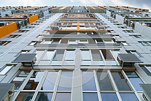 Facade of a modern multi-storey residential complex, apartment building exterior