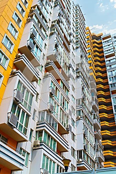 Facade of a modern multi-storey residential complex, apartment building exterior