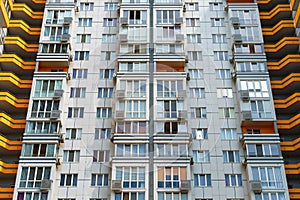 Facade of a modern multi-storey residential complex, apartment building exterior