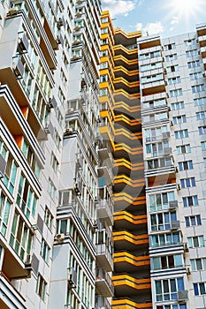 Facade of a modern multi-storey residential complex, apartment building exterior