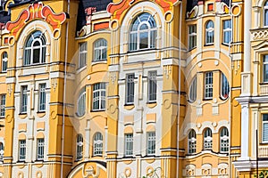 Facade of the modern multistory building in classical style close-up