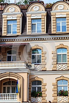 Facade of modern multistory building in classical style close-up