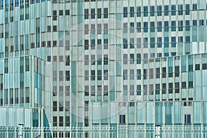 Facade of a modern office building with glazing, fragment