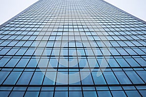 Facade of a modern office skyscraper building in the city