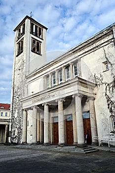 The facade of a modernist church with two bell tower in Poznan photo