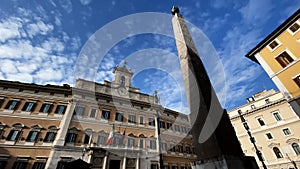 Facade of the Montecitorio Palace in Rome, seat of the Italian Chamber of Deputies in a sunny day