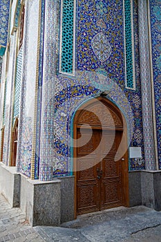 The facade of the mosque at the textile market in the old part of Dubai, made in the Iranian style., UAE.
