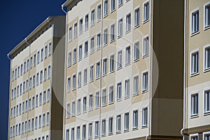 Facade of a new multi-storey building with many windows