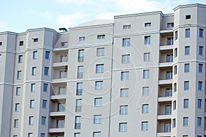 Facade of a new multi-story residential building. architecture and modern construction