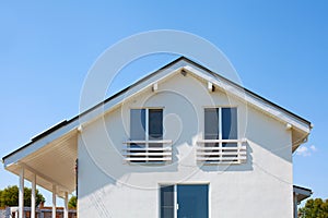 Facade of a new white frame house