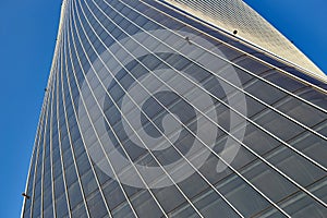 Facade of an office high-rise building. View from below