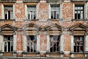 The facade of the old abandoned building