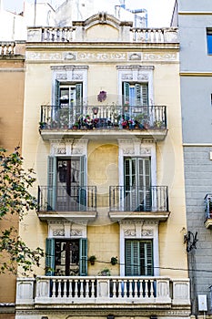 Facade of an old apartment building in the Eixample, Barcelona, Catalonia, Spain